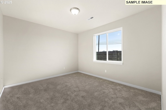 1201 NE Emerald Dr, Hermiston, OR 97838 - carpeted empty room with baseboards