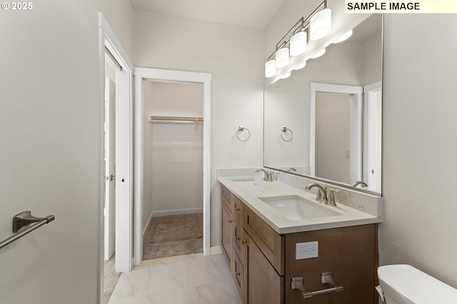 1201 NE Emerald Dr, Hermiston, OR 97838 - full bath with marble look tiles, double vanity, and a walk in closet