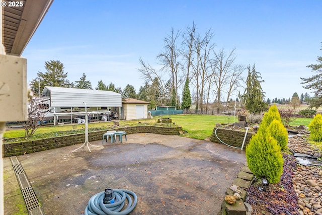 view of patio with a shed