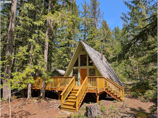 75887 E Rd 28, Rhododendron, OR 97049 - view of front facade featuring stairs, a deck, and a forest view