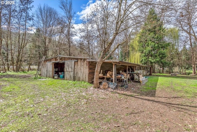 725 Rogue River Hwy, Gold Hill, OR 97525 - view of pole building with a lawn