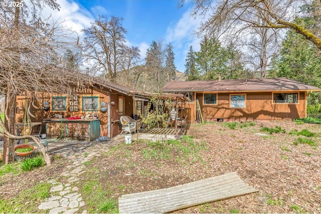 725 Rogue River Hwy, Gold Hill, OR 97525 - back of house featuring a patio area