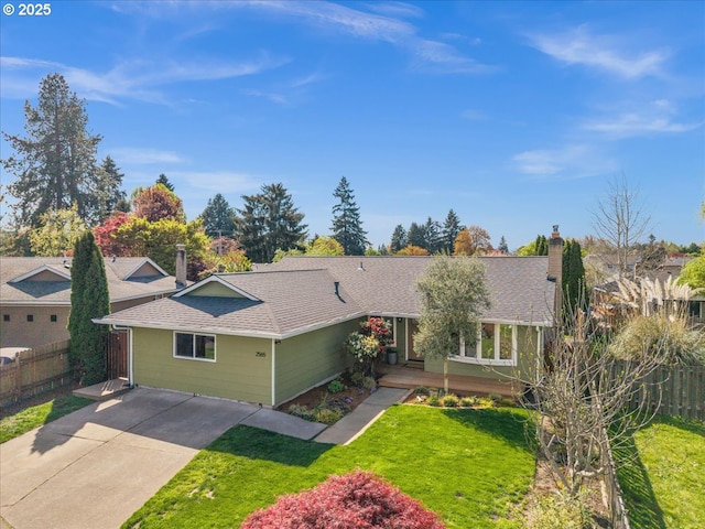 single story home featuring a chimney, roof with shingles, and concrete driveway