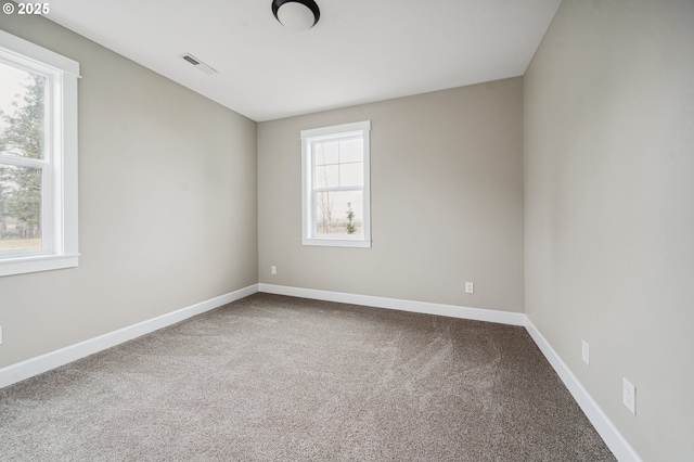 view of carpeted spare room