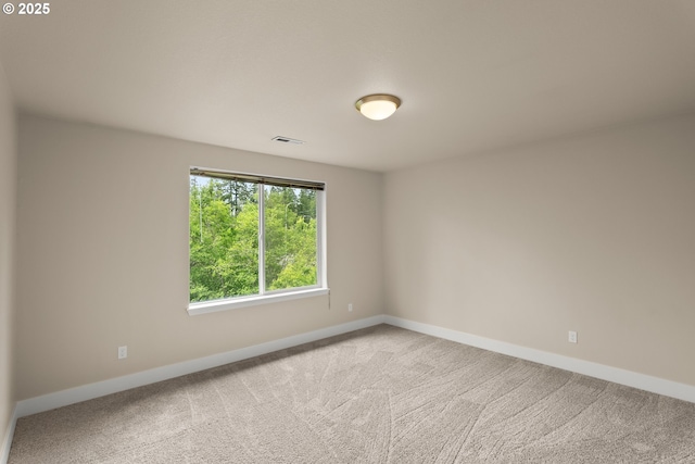 111 SE 49th Ct, Hillsboro, OR 97123 - carpeted spare room featuring baseboards