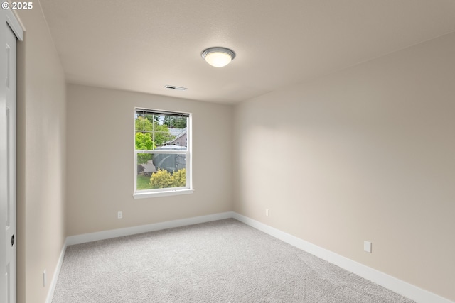 111 SE 49th Ct, Hillsboro, OR 97123 - spare room featuring carpet floors and baseboards