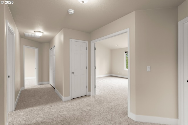 111 SE 49th Ct, Hillsboro, OR 97123 - corridor featuring carpet and baseboards