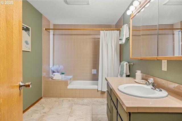 bathroom with vanity and shower / tub combo