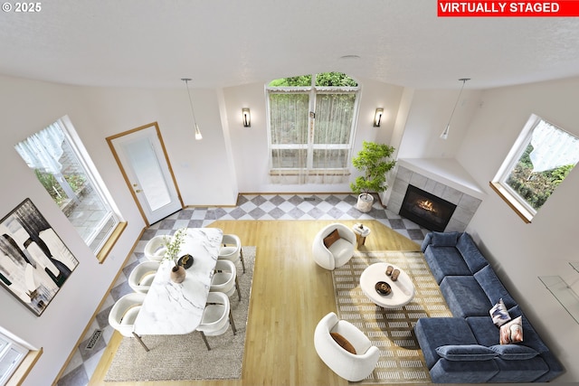 17445 S Beckman Rd, Oregon City, OR 97045 - living room featuring wood finished floors and a tiled fireplace