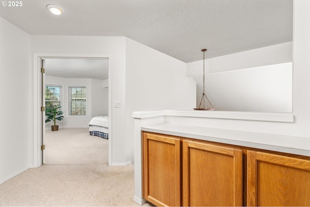 interior space with a textured ceiling