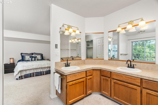 bathroom featuring vanity and a textured ceiling