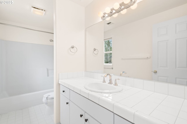 7408 SW Capitol Hwy, Portland, OR 97219 - bathroom with vanity, tile patterned flooring, and washtub / shower combination