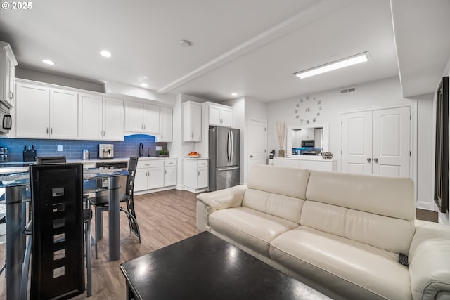 4604 NE 119th St, Vancouver, WA 98686 - living area featuring visible vents, recessed lighting, and wood finished floors