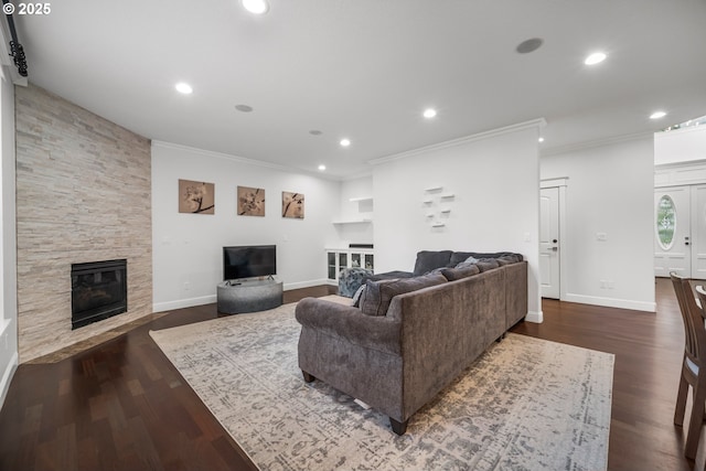 4604 NE 119th St, Vancouver, WA 98686 - living area featuring crown molding, dark wood-style flooring, a stone fireplace, and recessed lighting