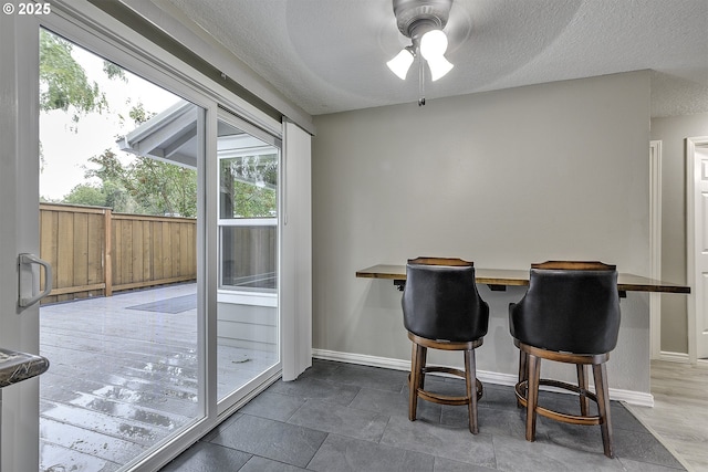 8396 SW Mohawk St, Tualatin, OR 97062 - dining space with ceiling fan and a textured ceiling