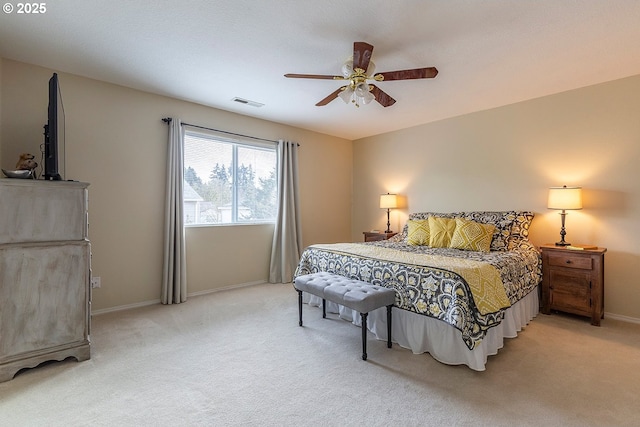 bedroom featuring baseboards, visible vents, ceiling fan, and carpet flooring