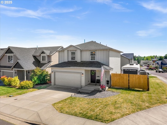 907 E 16th St, Lafayette, OR 97127 - view of front of house featuring concrete driveway, board and batten siding, roof with shingles, and a residential view