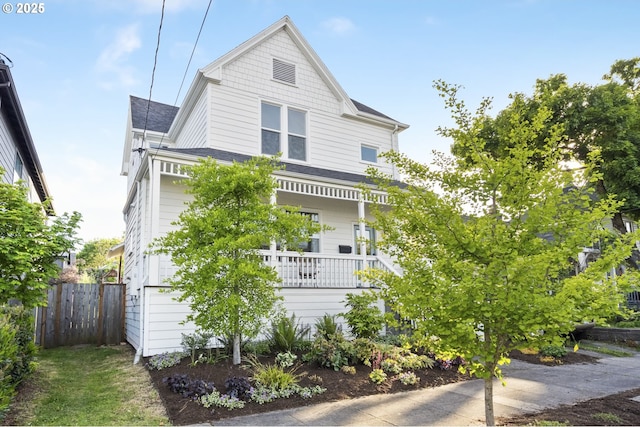 5106 N Bowdoin St, Portland, OR 97203 - view of front facade with fence, covered porch, and roof with shingles