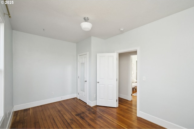 5106 N Bowdoin St, Portland, OR 97203 - unfurnished bedroom with hardwood / wood-style floors, baseboards, and a closet
