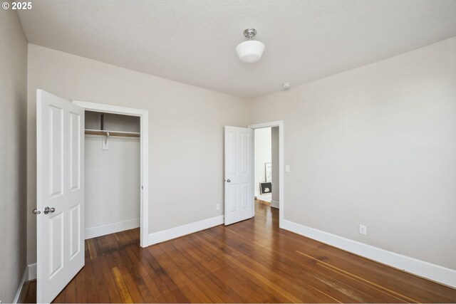 5106 N Bowdoin St, Portland, OR 97203 - unfurnished bedroom featuring baseboards, wood-type flooring, and a closet