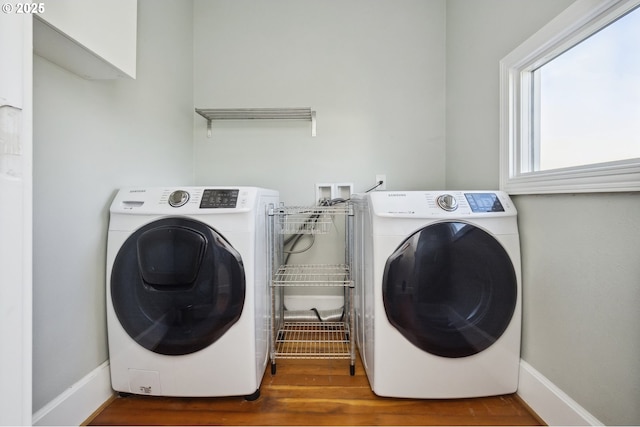 5106 N Bowdoin St, Portland, OR 97203 - clothes washing area featuring wood finished floors, washer and clothes dryer, and baseboards