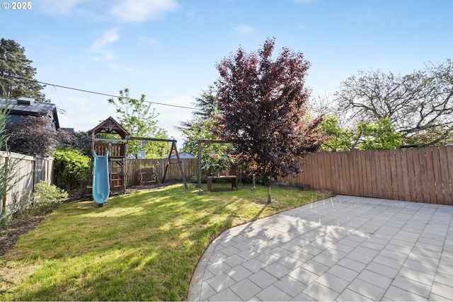 5106 N Bowdoin St, Portland, OR 97203 - view of yard with a playground and a patio