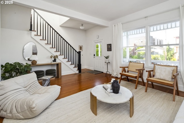 5106 N Bowdoin St, Portland, OR 97203 - living room featuring wood finished floors, stairs, and baseboards