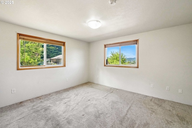 760 H St, Coos Bay, OR 97420 - carpeted spare room with healthy amount of natural light
