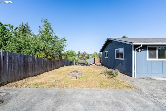 760 H St, Coos Bay, OR 97420 - view of yard with a fire pit and a deck