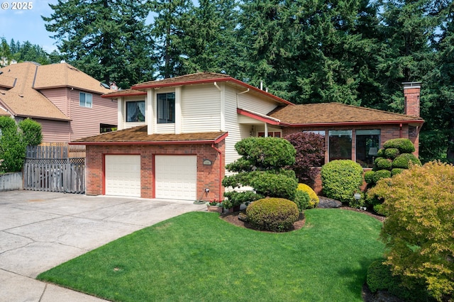 11560 SE 108th Ave, Happy Valley, OR 97086 - split level home featuring brick siding, a garage, concrete driveway, and a chimney