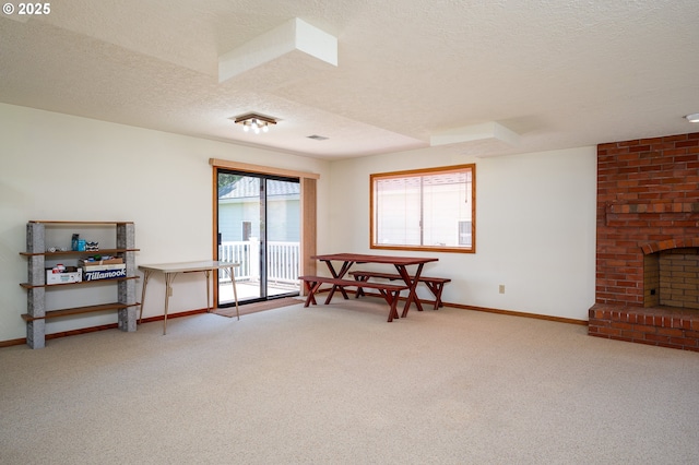 11560 SE 108th Ave, Happy Valley, OR 97086 - sitting room featuring a textured ceiling, carpet, and a fireplace