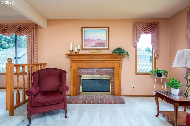 11560 SE 108th Ave, Happy Valley, OR 97086 - living area featuring carpet, a fireplace, and beamed ceiling