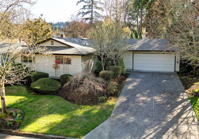 single story home featuring driveway, a front yard, an attached garage, and a shingled roof