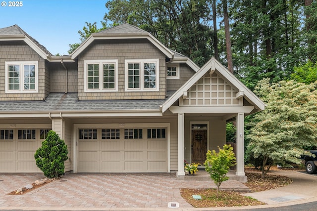 4661 Trillium, Woods, Lake Oswego, OR 97035 - view of front of home with a garage, a shingled roof, and decorative driveway