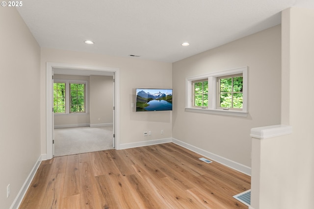 4661 Trillium, Woods, Lake Oswego, OR 97035 - spare room with light wood finished floors and recessed lighting