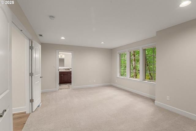 4661 Trillium, Woods, Lake Oswego, OR 97035 - unfurnished bedroom with recessed lighting, light colored carpet, and connected bathroom