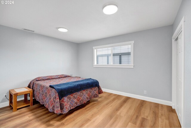 6836 NW Bony Rd, Yamhill, OR 97148 - bedroom featuring baseboards and light wood finished floors