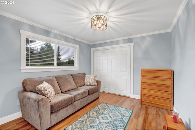 6836 NW Bony Rd, Yamhill, OR 97148 - living area featuring wood finished floors, ornamental molding, a chandelier, and baseboards