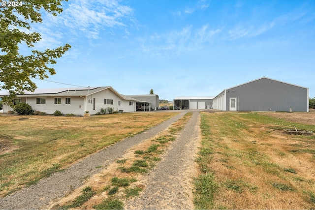 6836 NW Bony Rd, Yamhill, OR 97148 - view of front of property with driveway, a front yard, an outbuilding, and a detached garage