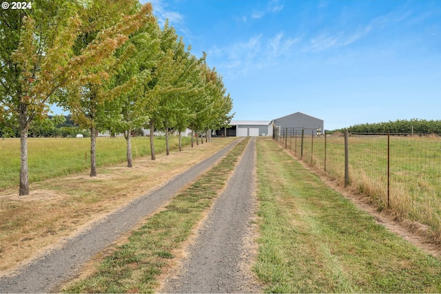 6836 NW Bony Rd, Yamhill, OR 97148 - view of dirt / gravel road with a pole building and a view of countryside