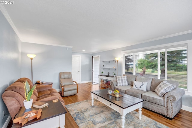 6836 NW Bony Rd, Yamhill, OR 97148 - living room featuring crown molding, light wood finished floors, baseboards, and recessed lighting