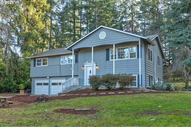 24492 SE Three Cedars St, Damascus, OR 97089 - raised ranch with an attached garage and a front yard