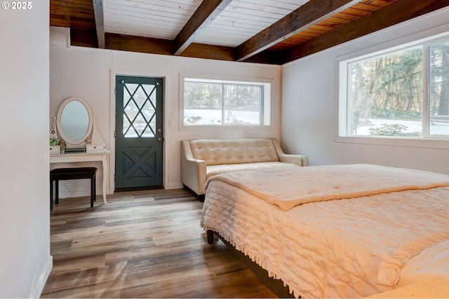 24492 SE Three Cedars St, Damascus, OR 97089 - bedroom featuring multiple windows, a wooden ceiling with exposed beams, and wood finished floors
