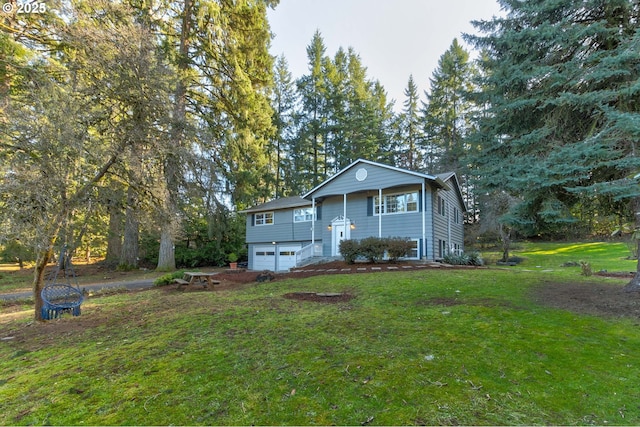 24492 SE Three Cedars St, Damascus, OR 97089 - bi-level home featuring a garage and a front lawn
