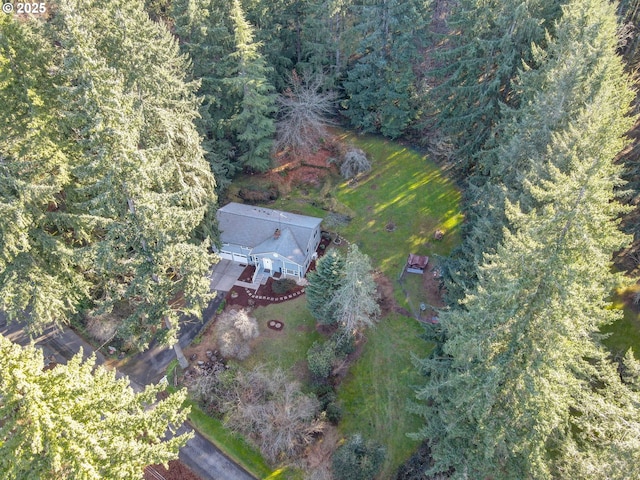 24492 SE Three Cedars St, Damascus, OR 97089 - aerial view of property and surrounding area featuring a heavily wooded area