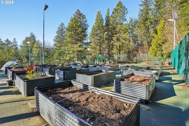 7548 SW Barnes Rd Unit G, Portland, OR 97225 - view of yard featuring a vegetable garden and view of scattered trees