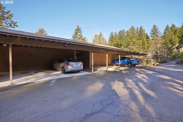 view of parking with a carport