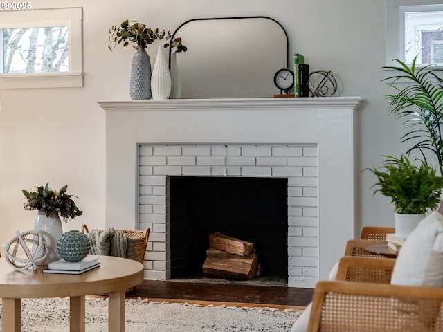 interior details featuring a fireplace and hardwood / wood-style floors