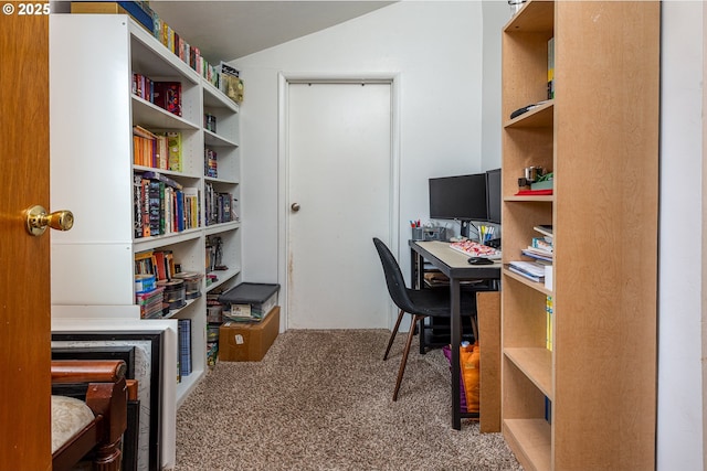 home office with lofted ceiling and carpet