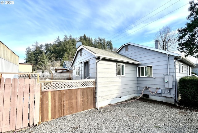 337 Clark St, Eugene, OR 97401 - view of side of property with crawl space and a chimney